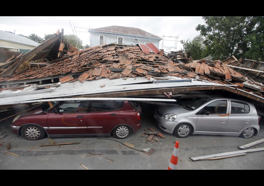 FILE - In this Feb. 26, 2011 file photo, cars lie crushed under a fallen building in central Christchurch, New Zealand, following a magnitude 6.3 earthquake. A powerful earthquake struck New Zealand on Monday, Nov. 14, 2016, reminding many of the quake that hit the nation in February 2011 and devastated the city of Christchurch, the country’s second-biggest city. (AP Photo/Mark Baker, Pool, File)